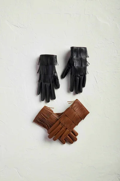 FAUX LEATHER FRINGE GLOVES BY MUD PIE