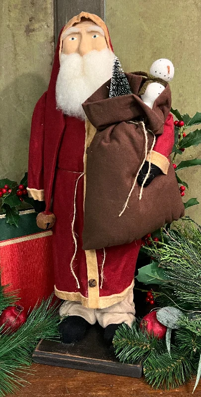 OTC-S9 Lg Santa holding Brown Bag with Snowman