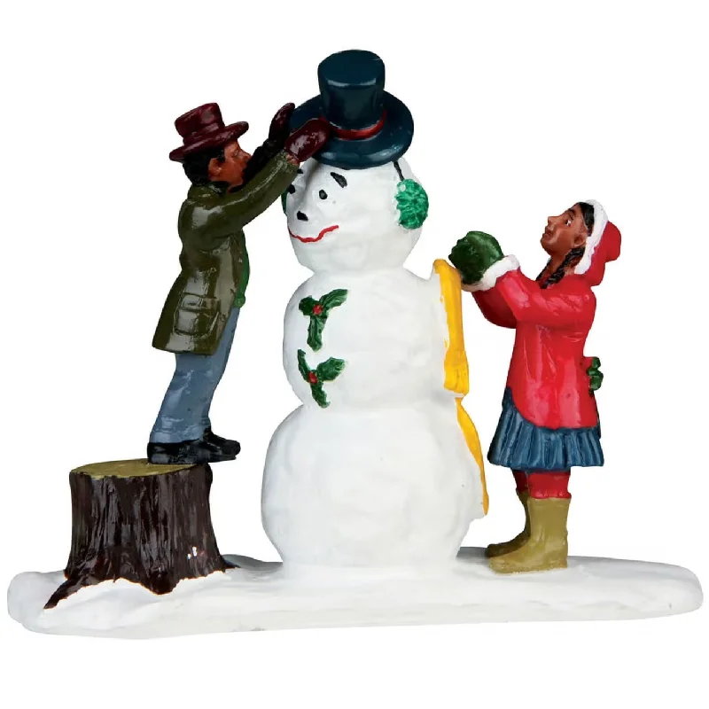 Lemax Caddington Village Figurine: Dressing Mr. Snowman #32732